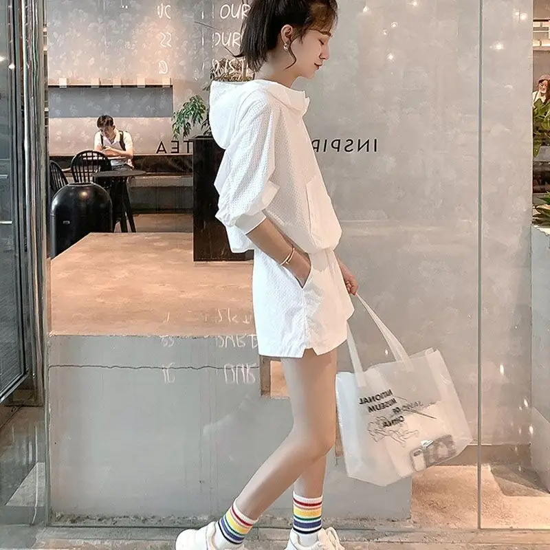 Description Picture 2 of item2023 Summer Sweat Suit White Women Hodded Short Sleeve Shorts Two Piece Set Korean Sporty Casual Tracksuit Hollow Out