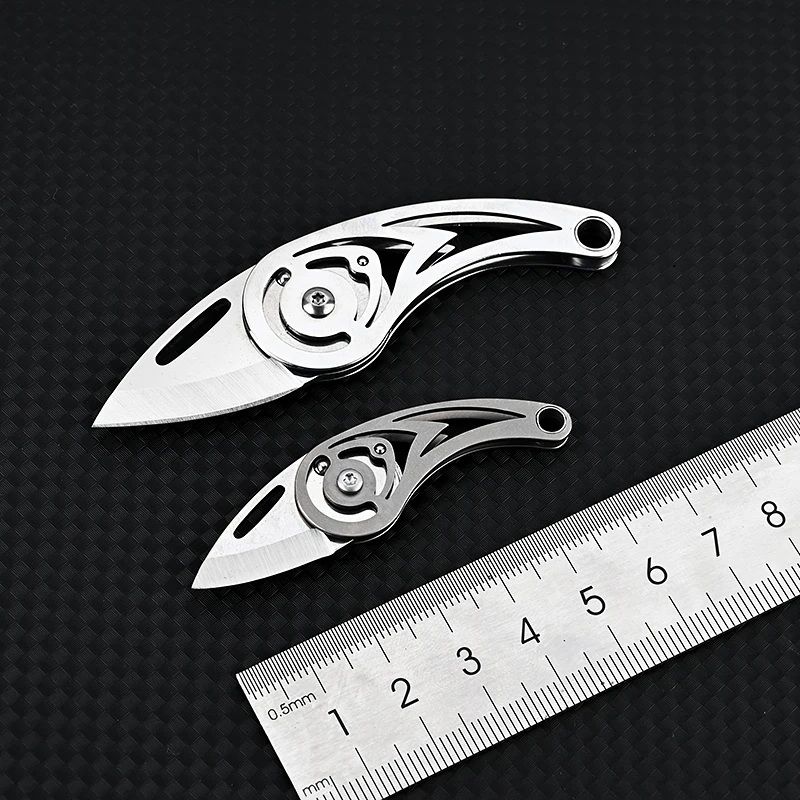 Description Picture 4 of itemTitanium Alloy Mini Folding Knife High Hardness D2 Steel Sharp Knife With Keychain Pendant Disassembly Express Open Box EDC Tool