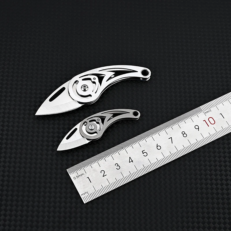 Description Picture 5 of itemTitanium Alloy Mini Folding Knife High Hardness D2 Steel Sharp Knife With Keychain Pendant Disassembly Express Open Box EDC Tool