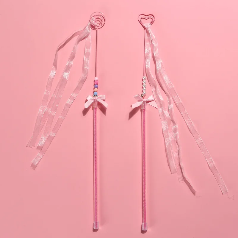 Description Picture 4 of itemPink Cat Teasing Stick with Bell Handmade Bowknot Cat Toy Feather Heart Tassel Streamer Interactive Pet Toy Pet Accessories