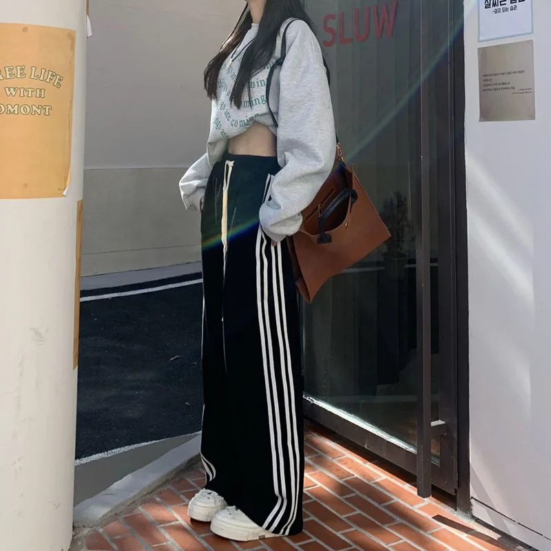 Description Picture 5 of itemZoki Black Striped Sweatpants Women Preppy Style High Waist Loose Casual Trousers Korean Chic Lace Up Streetwear Wide Leg Pants