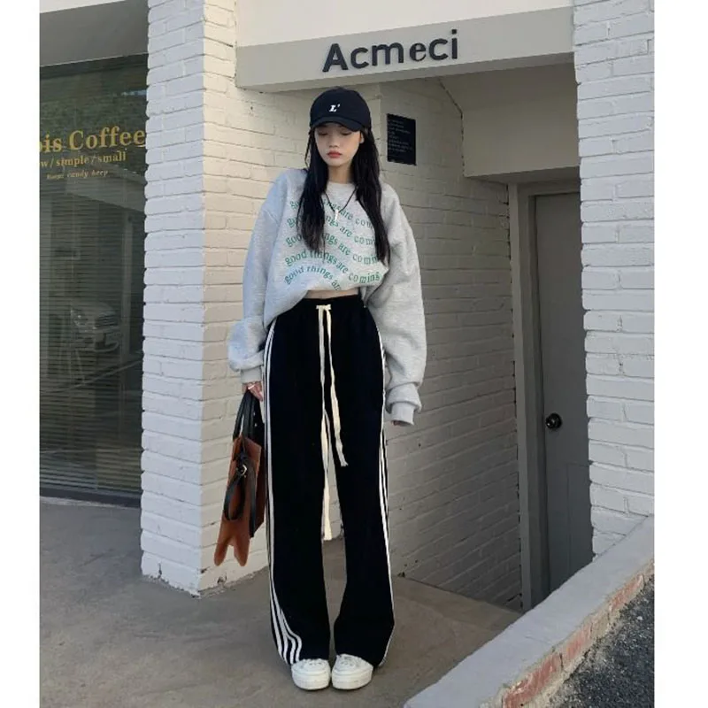 Description Picture 6 of itemZoki Black Striped Sweatpants Women Preppy Style High Waist Loose Casual Trousers Korean Chic Lace Up Streetwear Wide Leg Pants