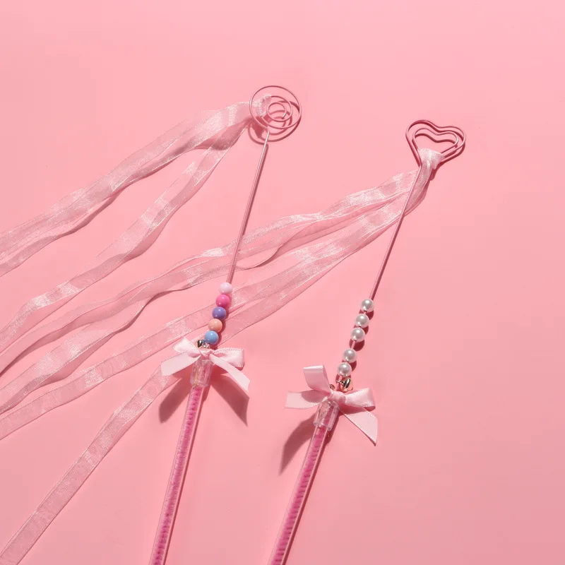 Description Picture 3 of itemPink Cat Teasing Stick with Bell Handmade Bowknot Cat Toy Feather Heart Tassel Streamer Interactive Pet Toy Pet Accessories