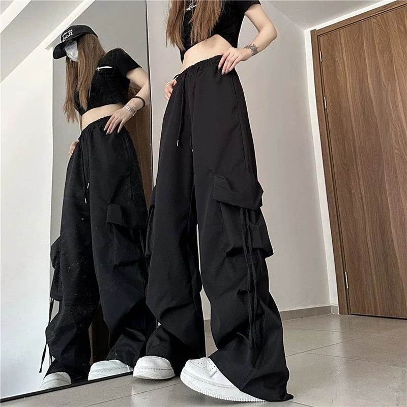 Description Picture 3 of itemZoki Harajuku Women Cargo Pants Streetwear Y2K Hip Hop Black Trousers Fashion High Waist Lace Up Female Loose Design Pants New