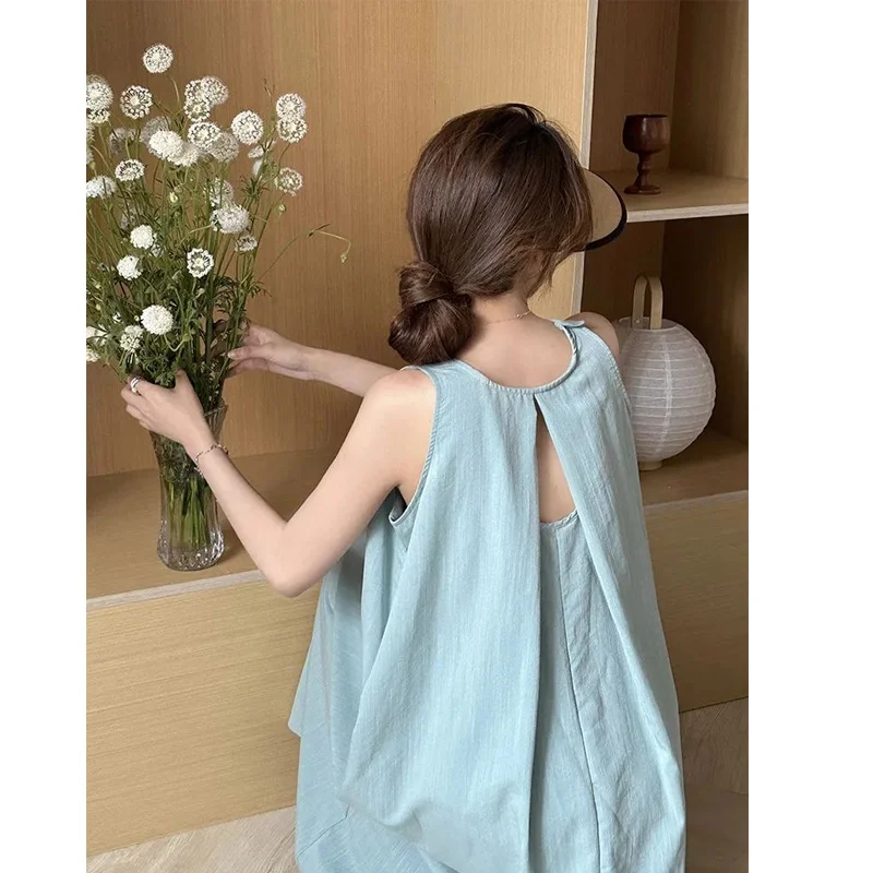 Summer New Holiday Style Hollow Out Sleeveless Hanging Neck Dress Solid Loose Backless Dresses Elegant Fashion Women Clothing