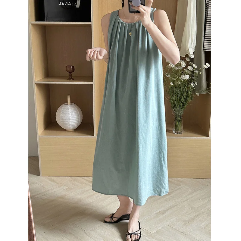 Summer New Holiday Style Hollow Out Sleeveless Hanging Neck Dress Solid Loose Backless Dresses Elegant Fashion Women Clothing