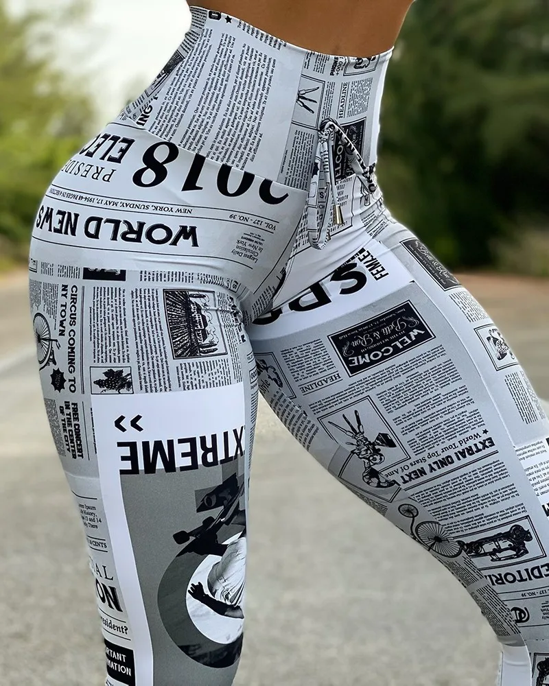 Description Picture 3 of itemWomen's casual sexy newspaper printed breeches Women's cartoon high waist Leggings Women's Sportswear