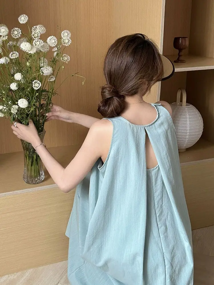 Summer New Holiday Style Hollow Out Sleeveless Hanging Neck Dress Solid Loose Backless Dresses Elegant Fashion Women Clothing