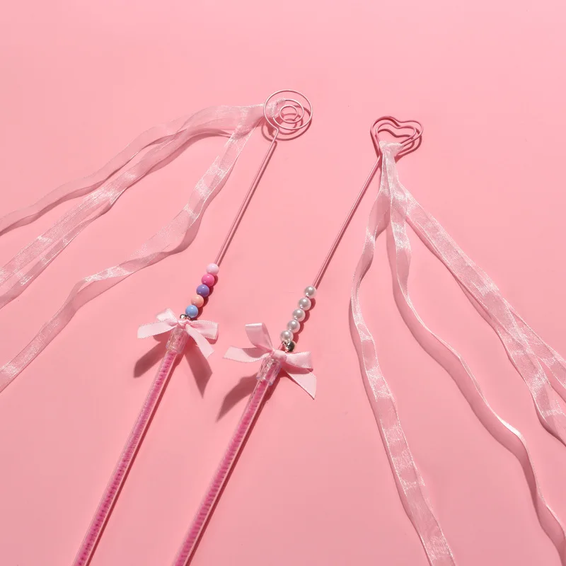Description Picture 2 of itemPink Cat Teasing Stick with Bell Handmade Bowknot Cat Toy Feather Heart Tassel Streamer Interactive Pet Toy Pet Accessories