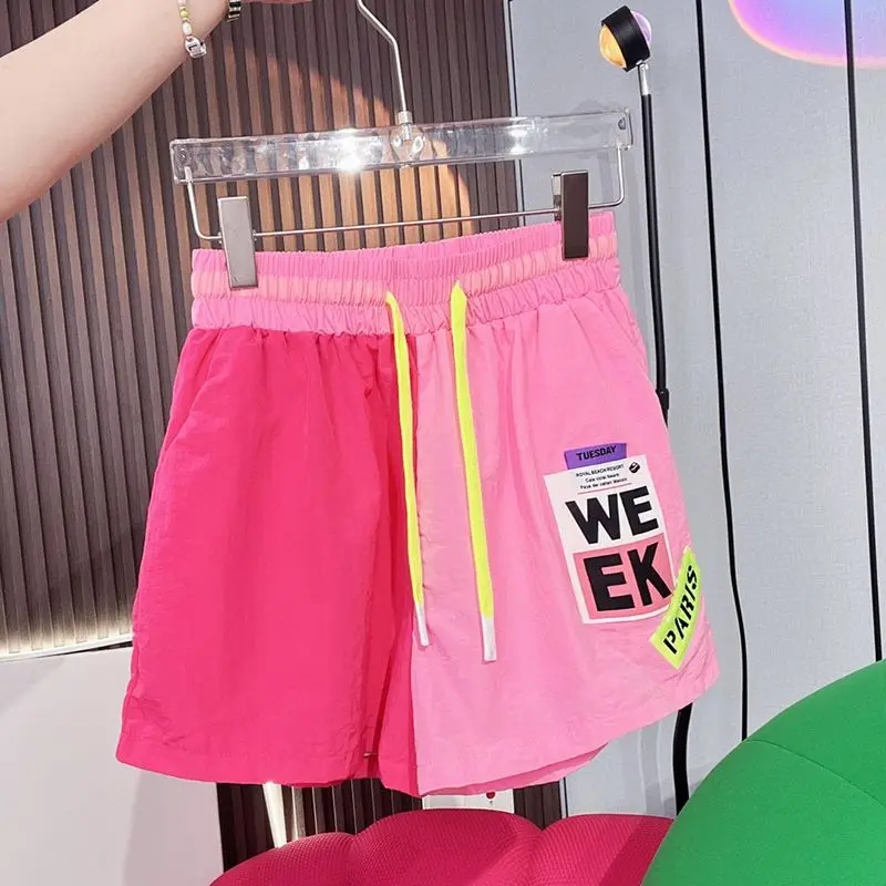 Description Picture 4 of itemDAYIFUN Sports Shorts Women Summer Fashion Contrasting Color Patchwork Design Casual Capris New Elastic Waist Lace Up Shorts