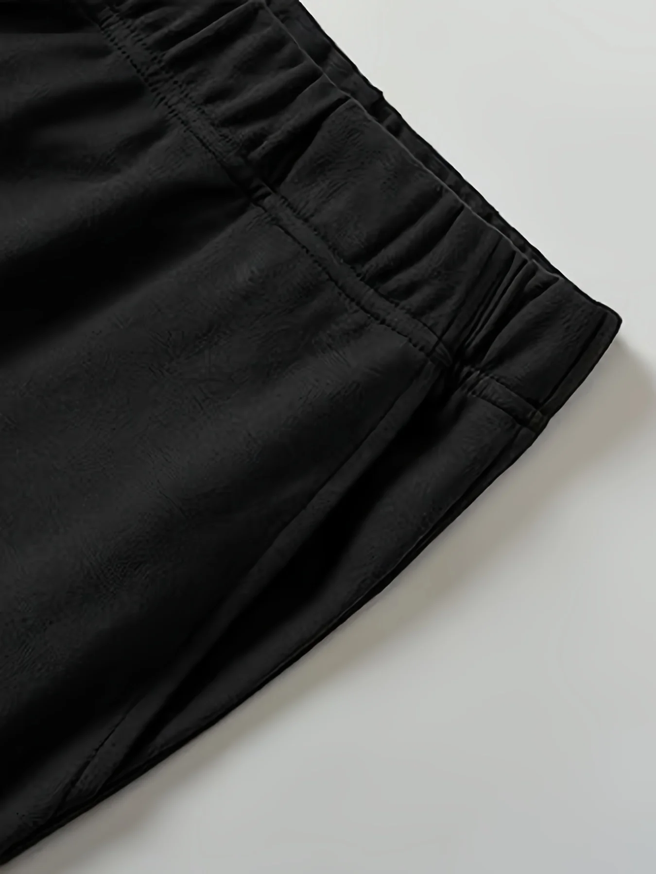 2023 summer new plus-size women's knitted fabric pocket fashion design sense capri pants